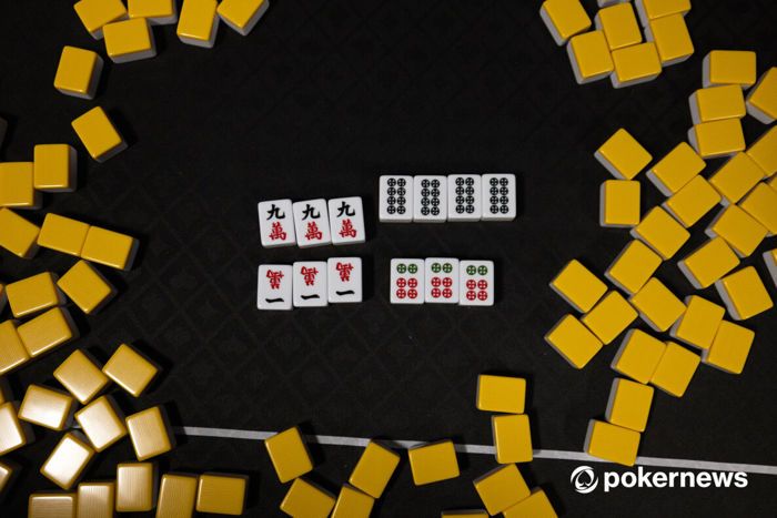 People playing a game of Mahjong