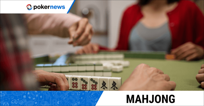 People playing a game of Mahjong